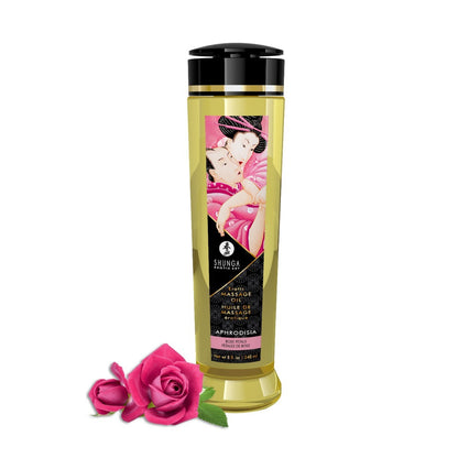 Shunga massage oil bottle with a pink rose on a white background