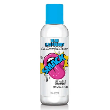Bottle of Snackable Lickable Warming Massage Oil with blue raspberry flavor on a white background