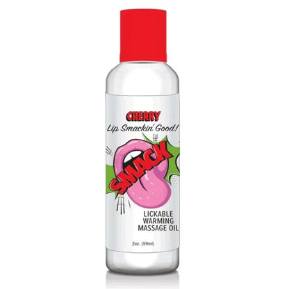 Bottle of Cherry Lickable Warming Massage Oil with red cap on white background