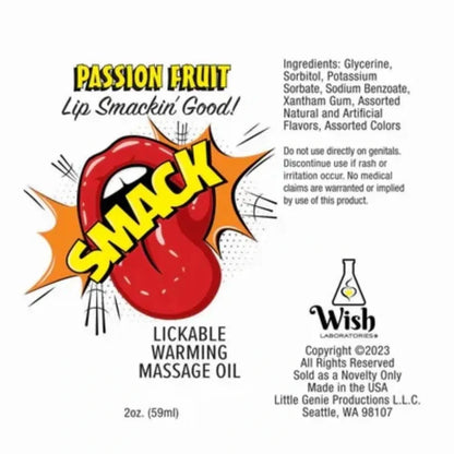 Label for Smack Lickable Warming Massage Oil with a red tongue graphic and product details.