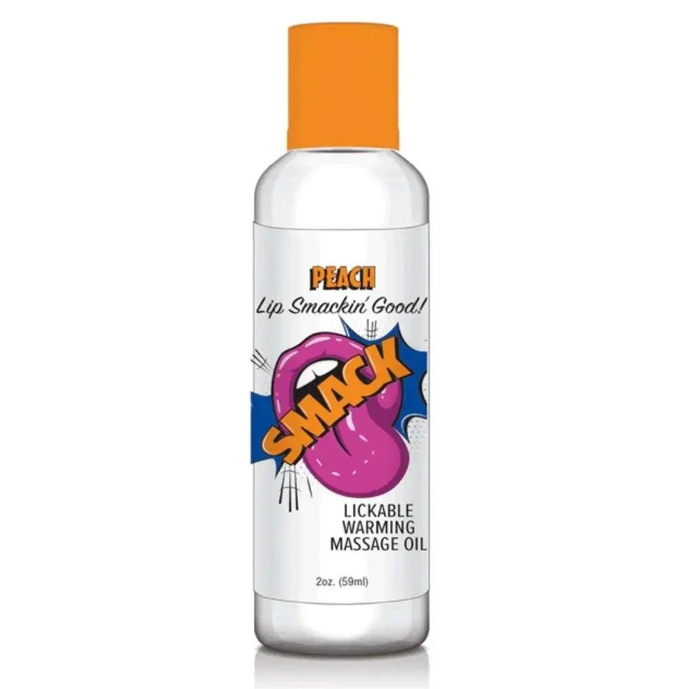 Bottle of lickable warming massage oil with orange cap on white background