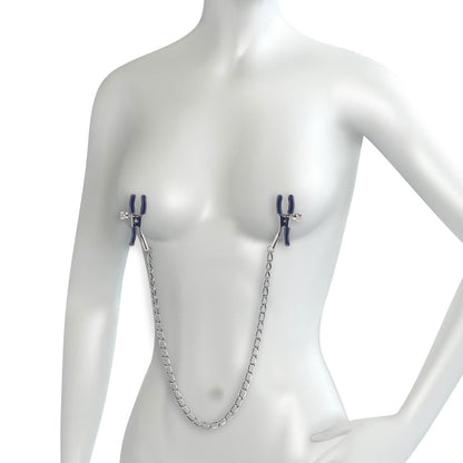 Mannequin wearing a nipple clamp bra with metal chain on a white background