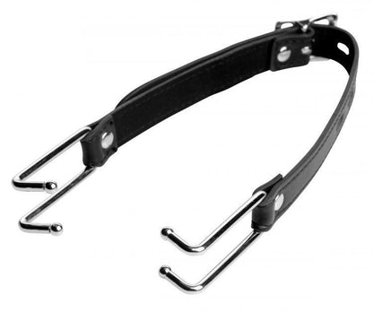 Black leather belt with metal hooks on a white background