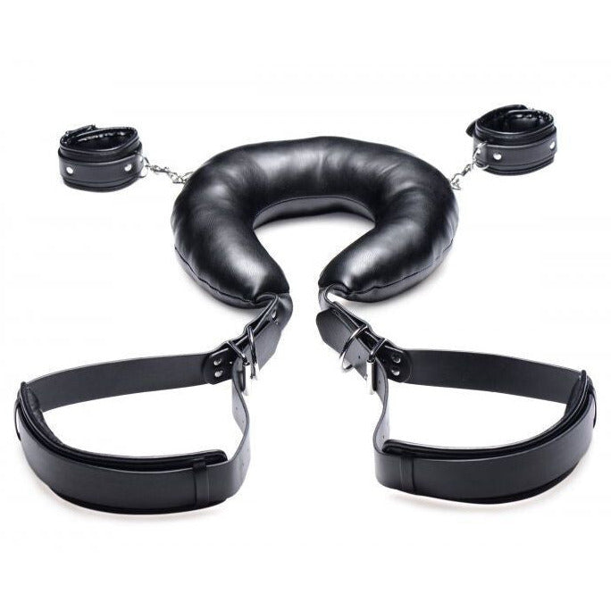 Black leather restraint set on a white background