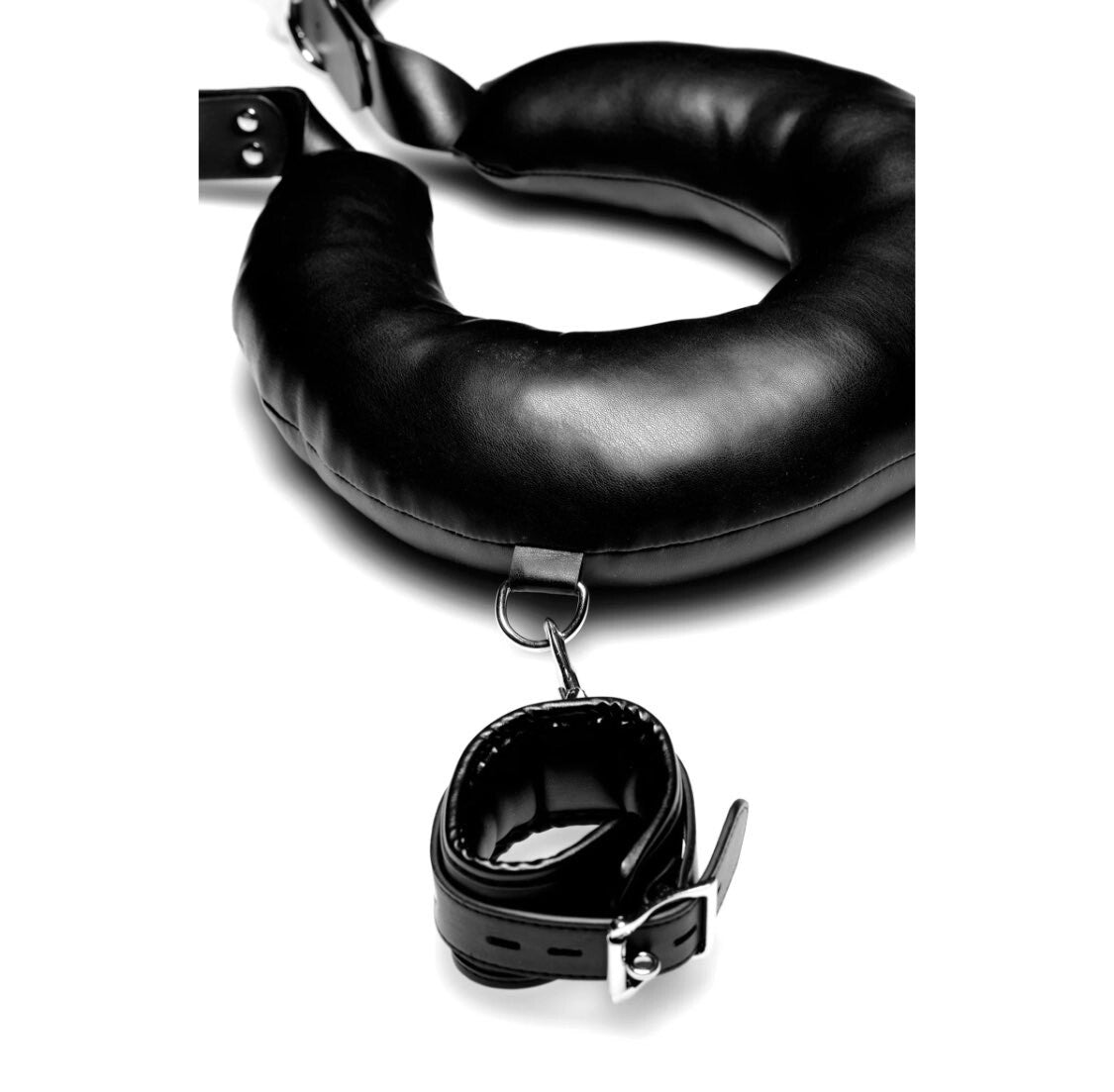 Black leather neck cushion with attached cuff on a white background