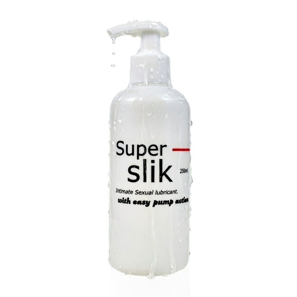 Super Slik lubricant bottle on a white background