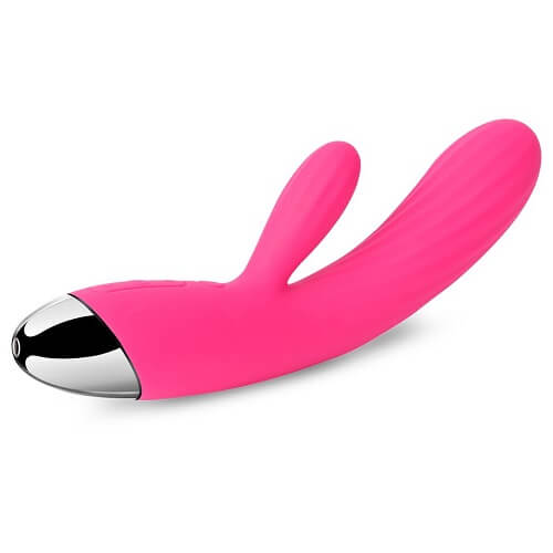 Pink and silver massage device on a white background