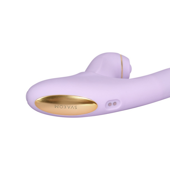 Purple electronic device with gold accents on a white background