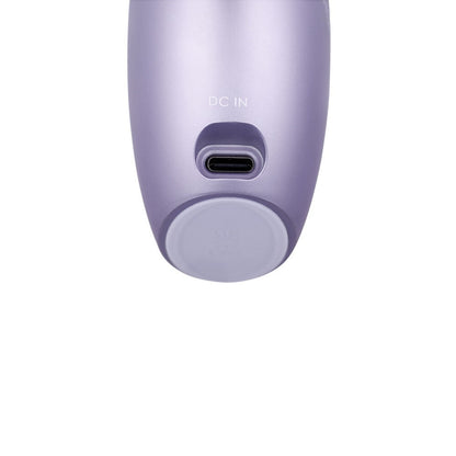 Close-up of a purple electronic device with USB-C port on a white background