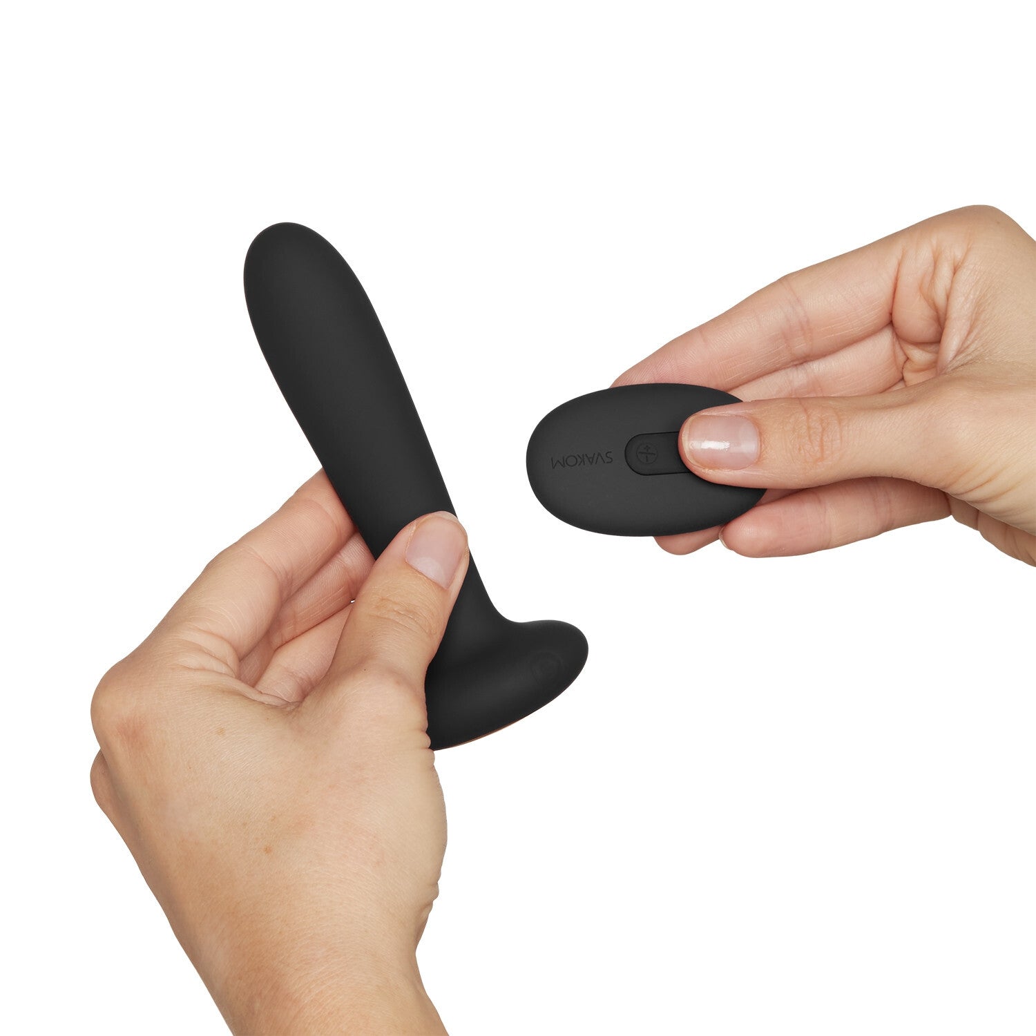 Black silicone product held by a hand on a white background