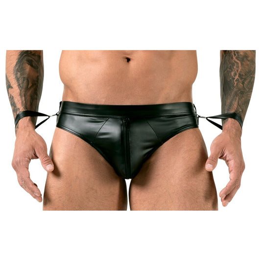 Black leather thong worn by a person with tattoos on a white background