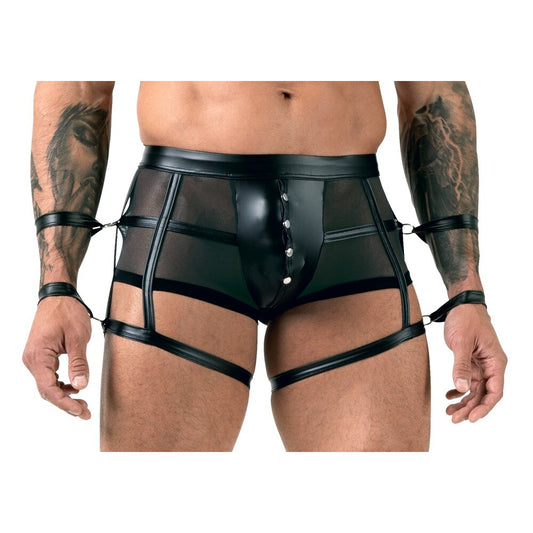 Black leather harness worn by a person on a white background