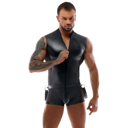 Man wearing a black leather vest and shorts on a white background