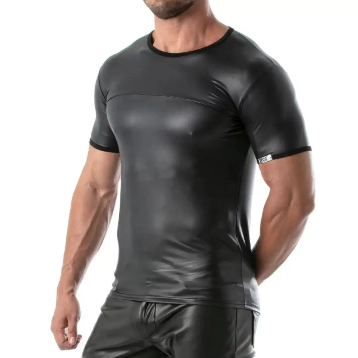 Man wearing a black leather-like outfit on a white background