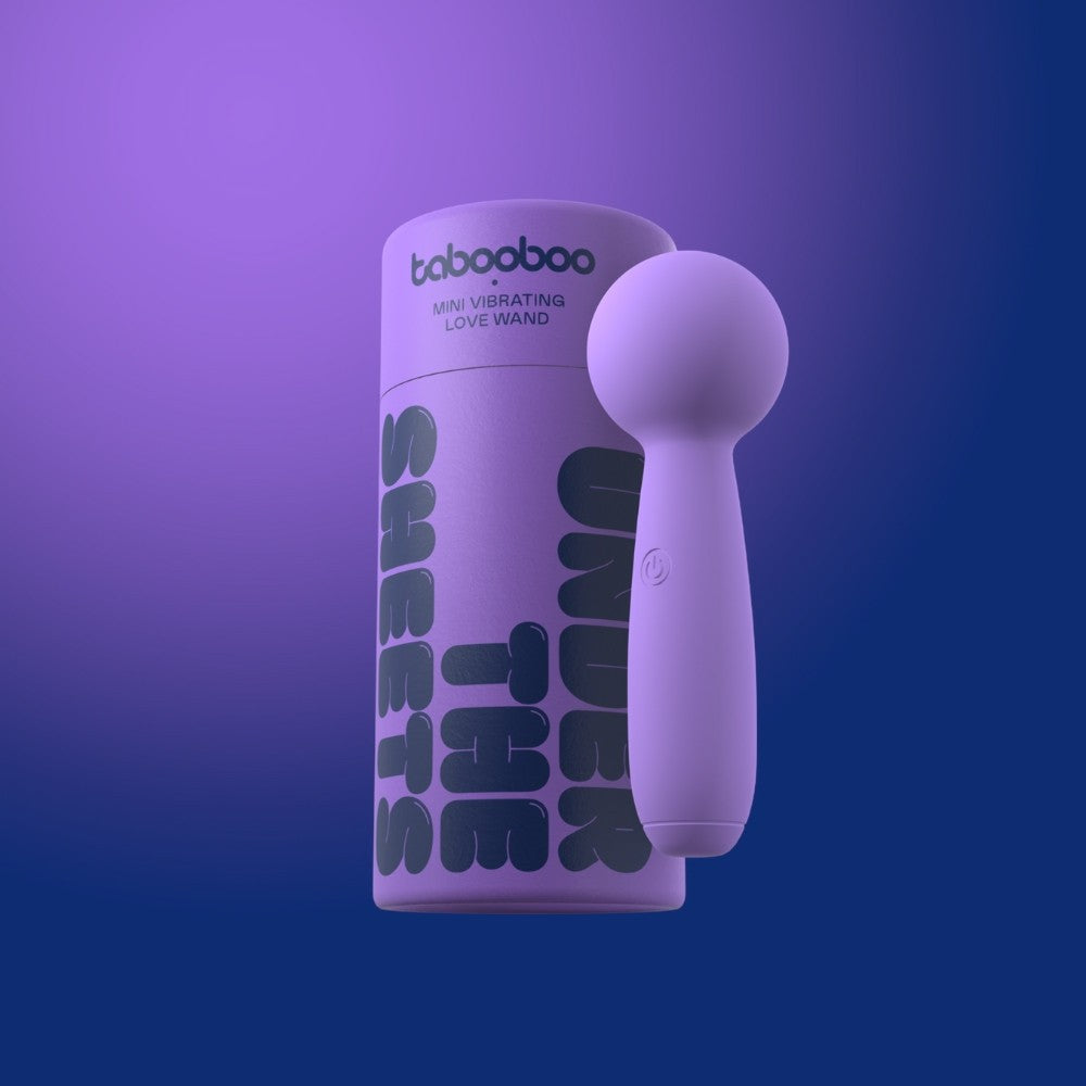 Purple handheld device with packaging labeled 'tabooboo' on a gradient purple background