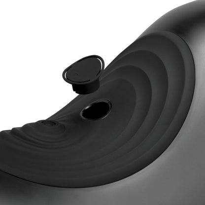 Close-up of a black sex machine with a white background