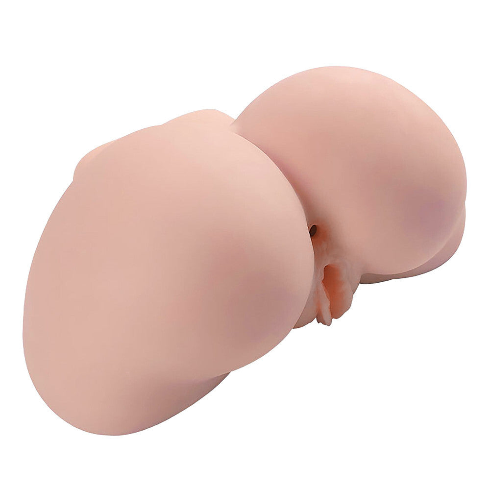Silicone mold shaped like a human ass and vagina on a white background