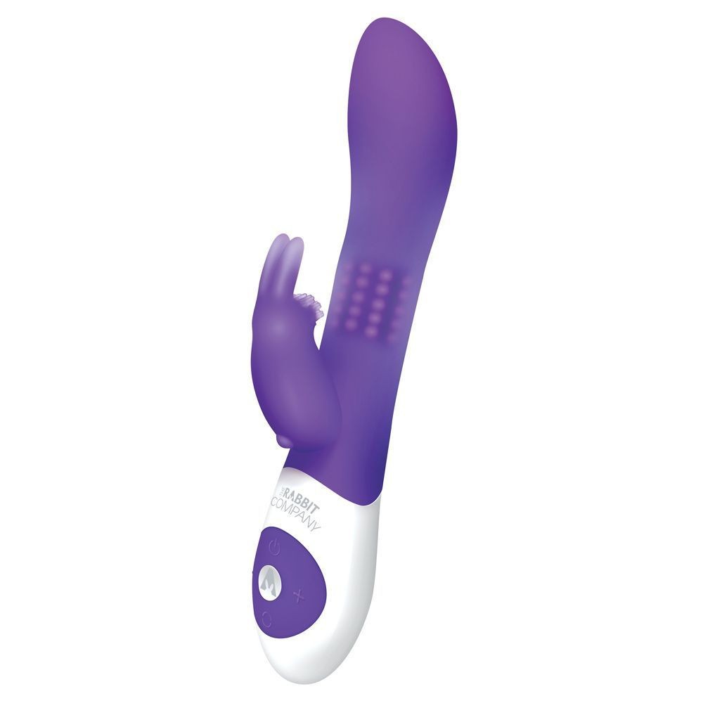 Purple and white vibrating rabbit with a textured handle on a white background