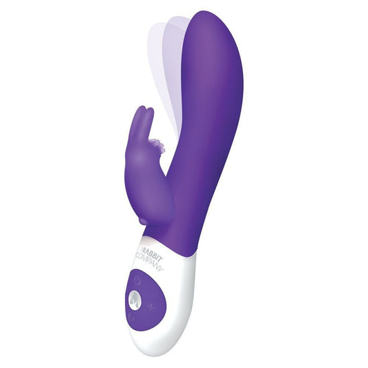Purple and white electronic massage device on a white background