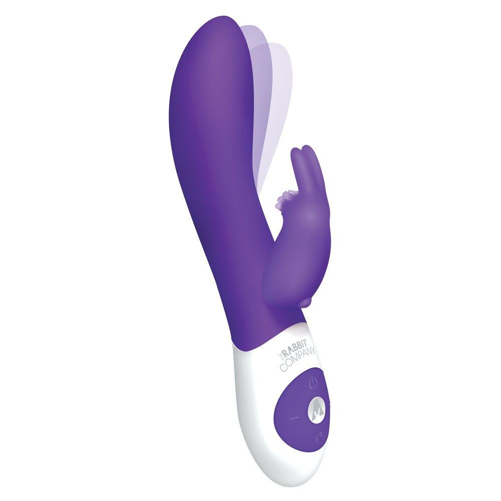 Purple and white masssage device on a white background
