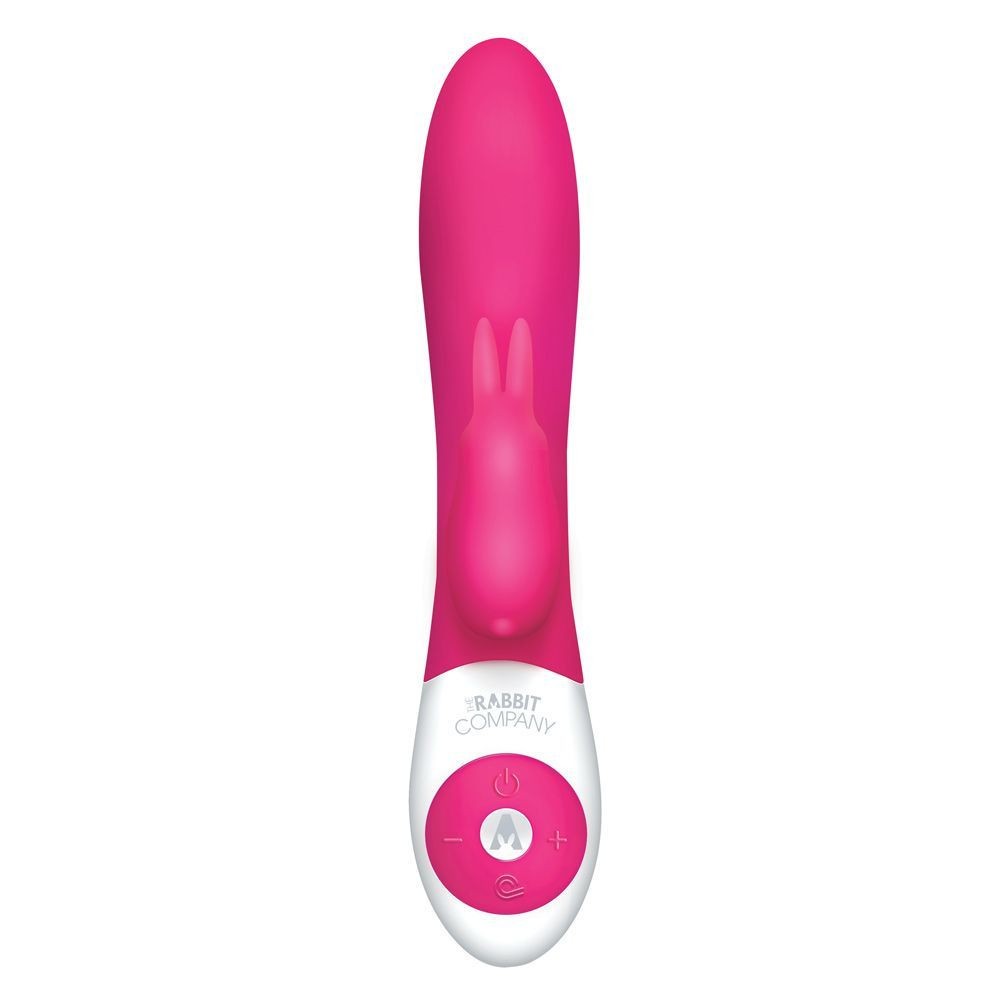 Pink and white electronic massager with rabbit design on a white background