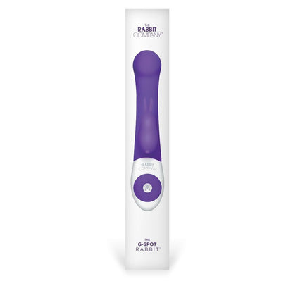 Purple and white G-Spot rabbit-shaped product in packaging on a white background