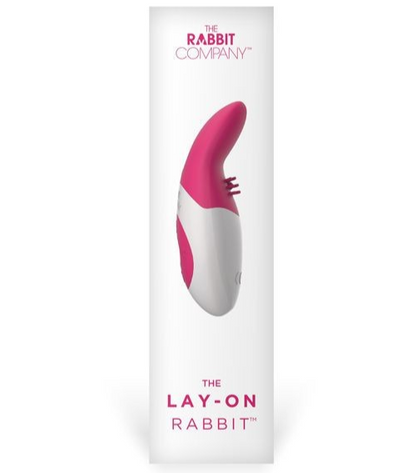 Pink and white 'The Lay-On Rabbit' product packaging from The Rabbit Company on a white background.