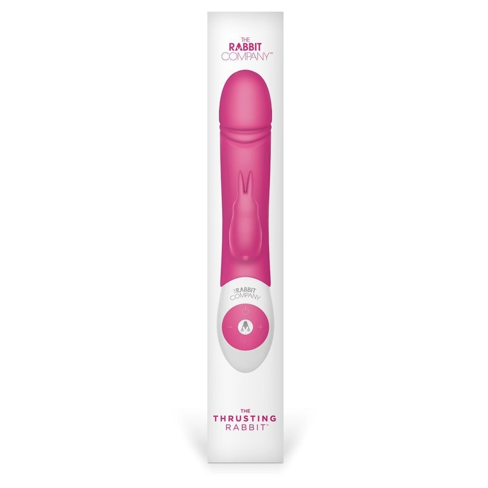 Pink sex toy with packaging labeled 'The Thrusting Rabbit' by 'The Rabbit Company' on a white background.