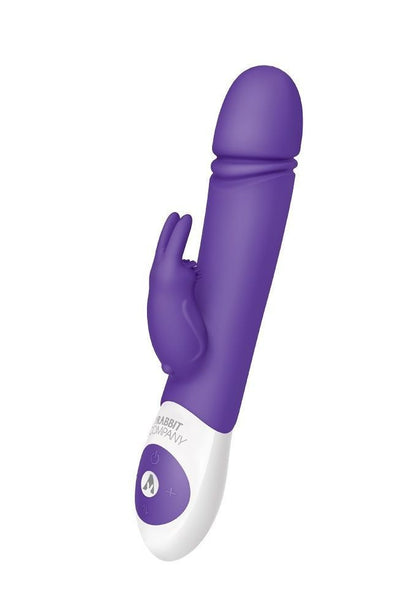 Purple and white sex toy with branding on a white background