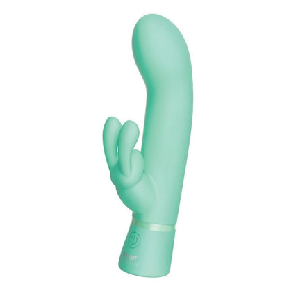 Turquoise-colored rabbit vibrator on a white background