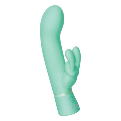Mint green silicone massage wand on a white background