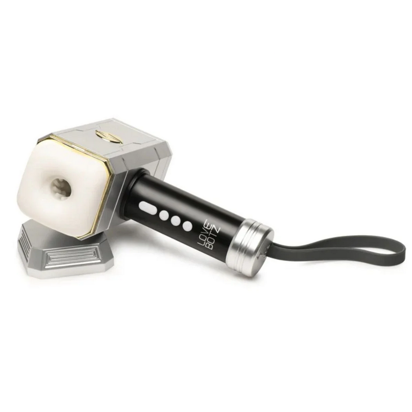 Hammer-shaped masturbator with a white head and black handle on a white background