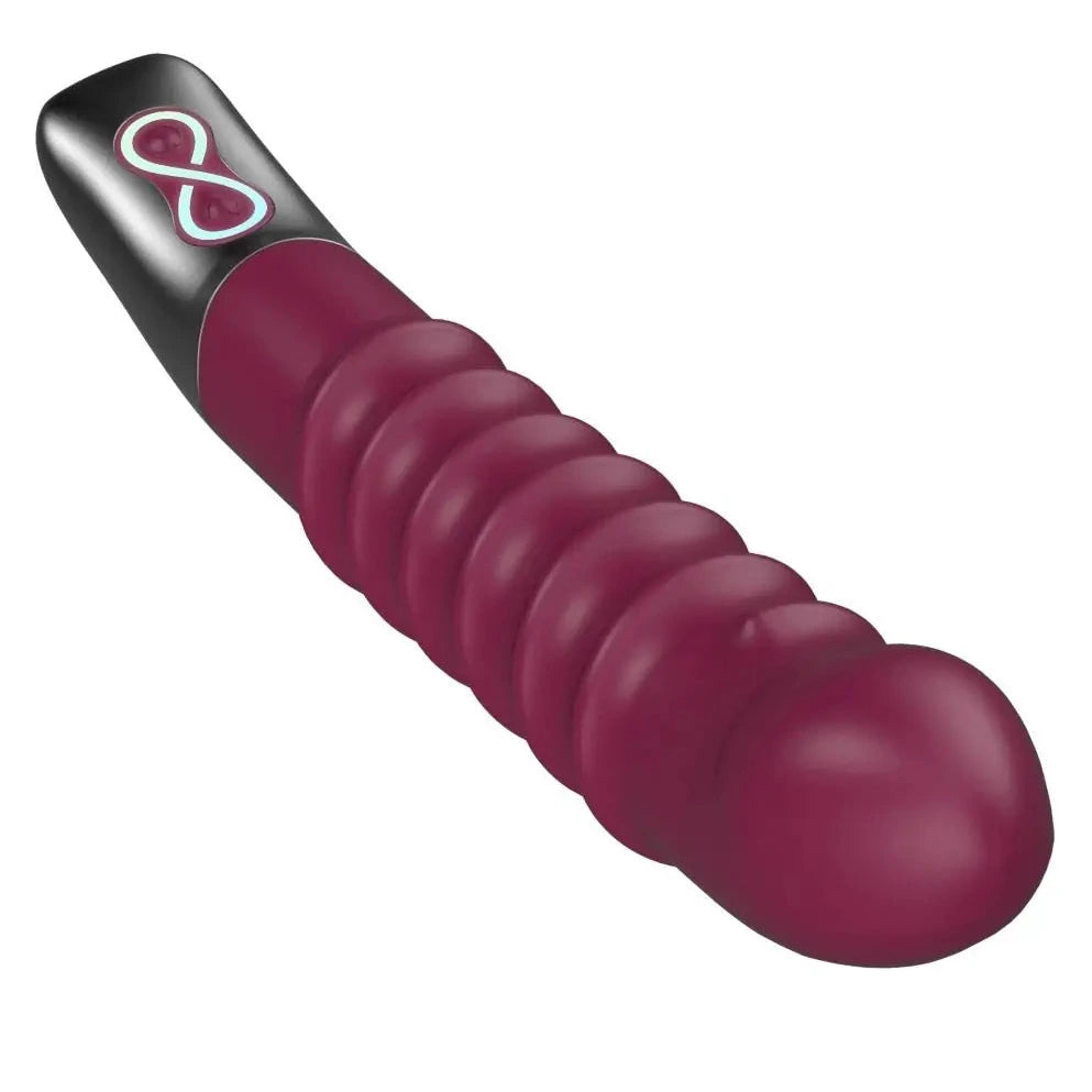 Purple and silver massager on a white background