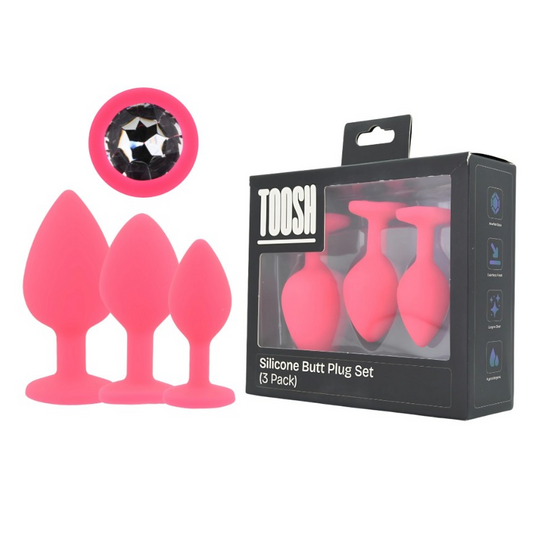 Set of pink silicone butt plugs with packaging labeled 'TOOSH' on a white background.
