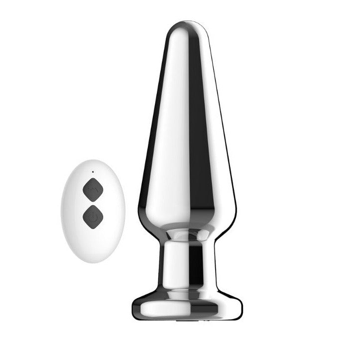 Chrome butt plug and remote control on a white background