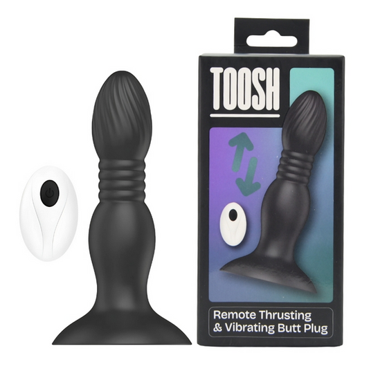 Black remote thrusting and vibrating butt plug with packaging on a white background
