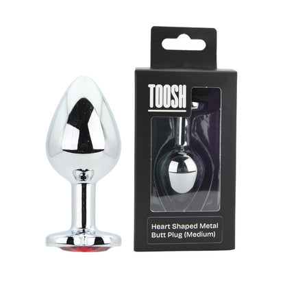 Heart-shaped metal butt plug with packaging on a white background