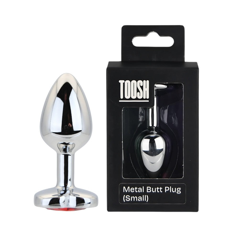 Metal butt plug with packaging labeled 'TOOSH' on a white background