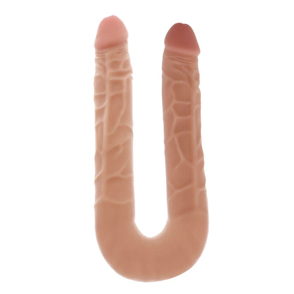 Silicone product shaped like a 'U' with textured surface on a white background