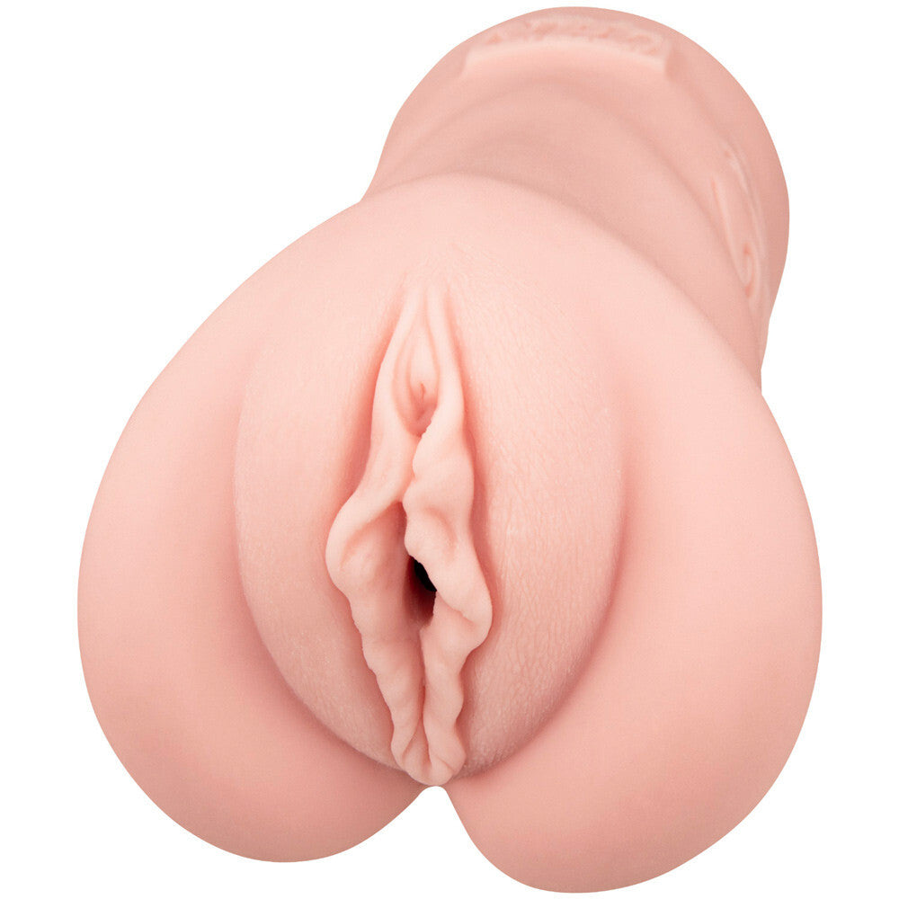 Realistic silicone model of a human vagina on a white background