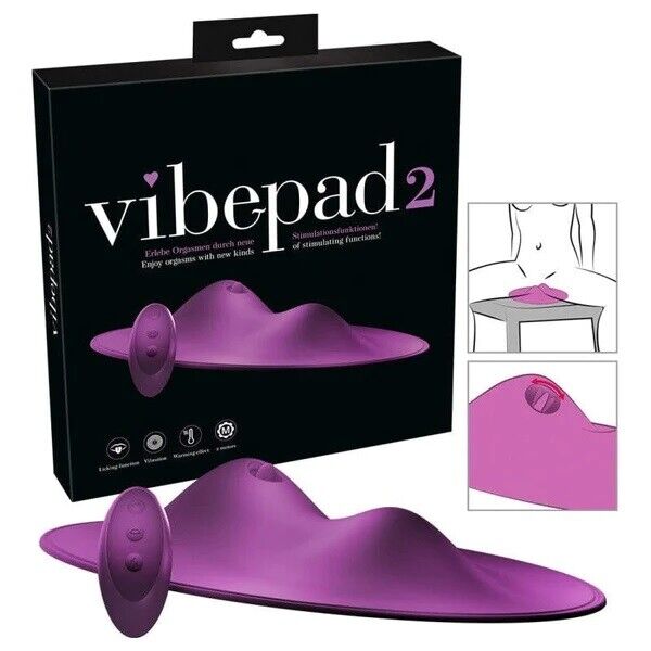 Purple 'vibepad 2' device with packaging on a white background