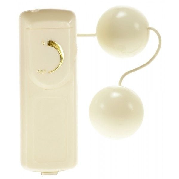 Cream-colored vibrating kegel balls with spherical design on a white background