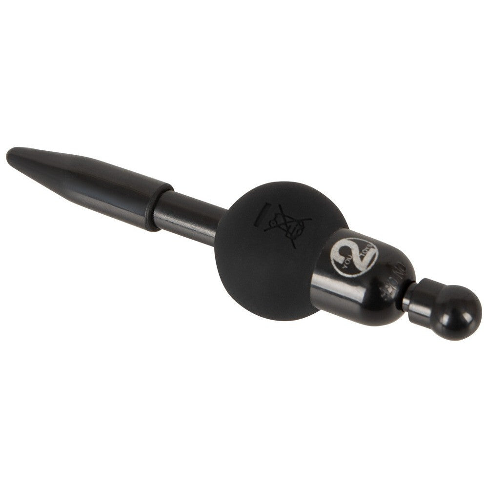 Black metal penis plug with spherical ends on a white background