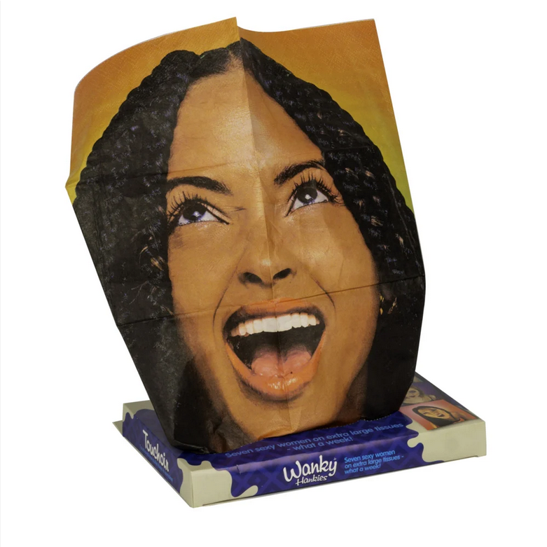 Cardboard cutout of a woman's face with a surprised expression, featuring the brand 'Wanky'.