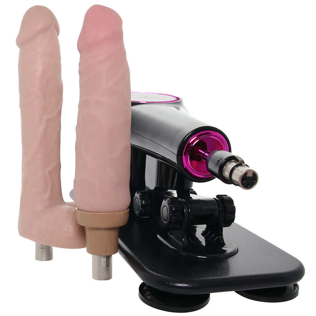 Black sex machine with pink dildos on a white background