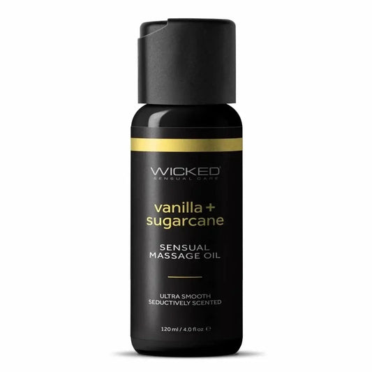 Black massage oil bottle labeled 'Wicked Sensual Care' with 'lemongrass + ginger' on a white background
