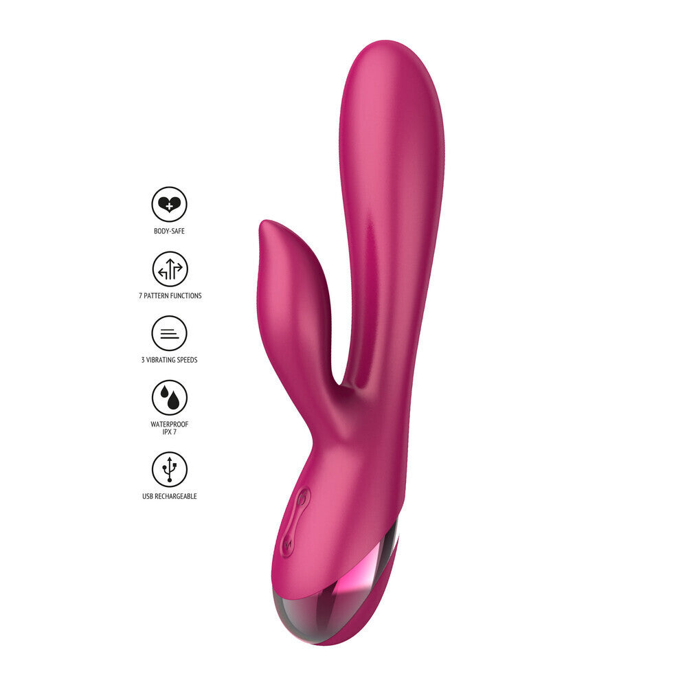 Pink rabbit-shaped vibrator with control buttons on a white background