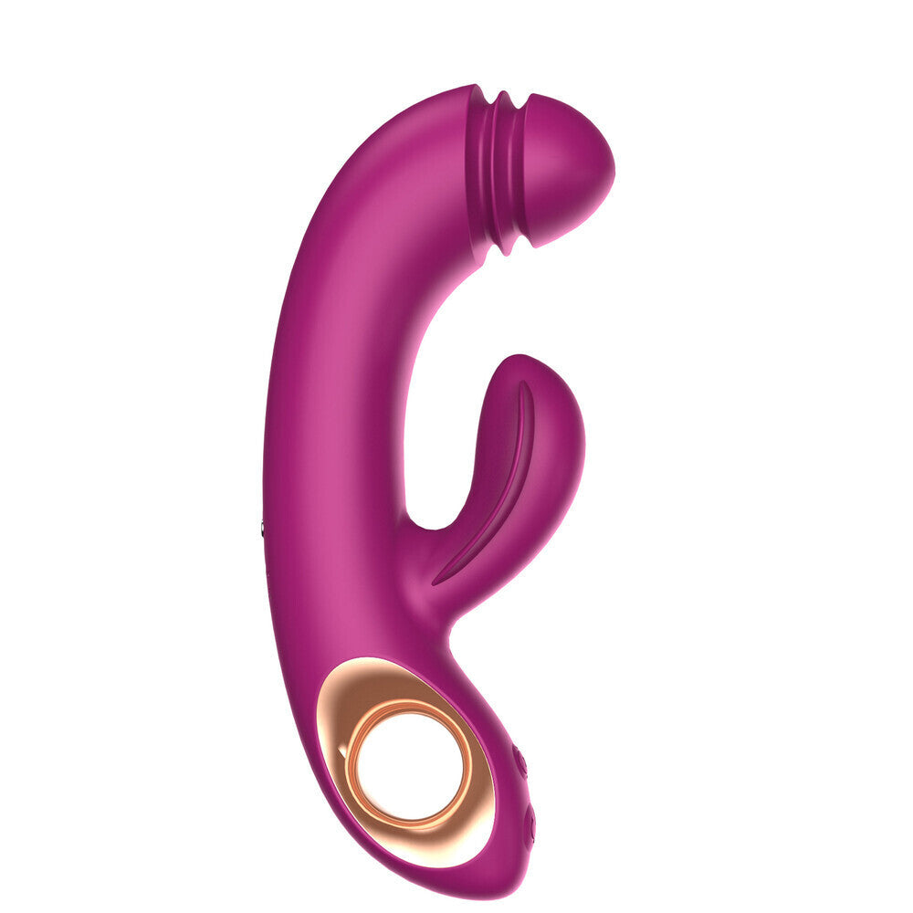 Purple and gold vibrator rabbit on a white background
