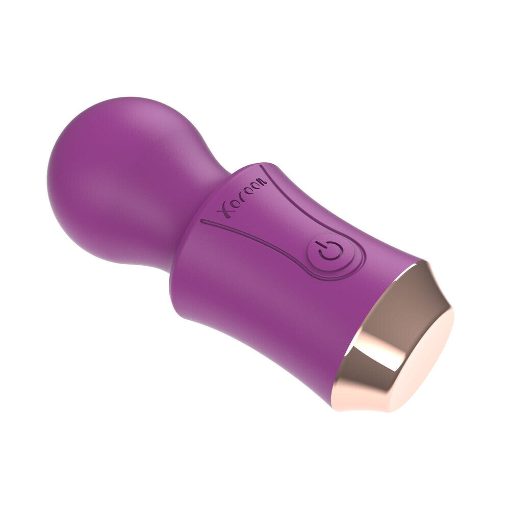Purple and rose gold vibrator wand on a white background