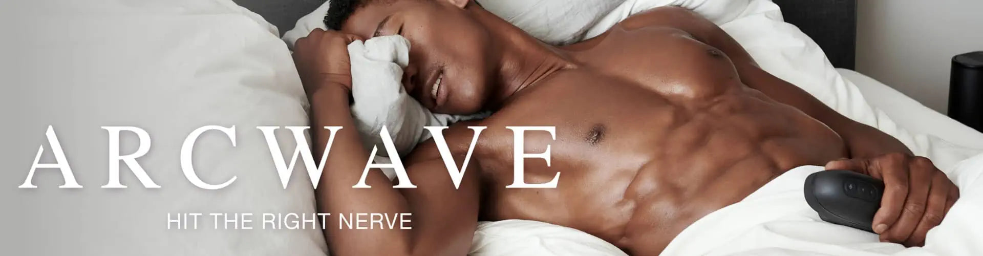 Man lying on a bed with 'Arcwave' branding displayed.